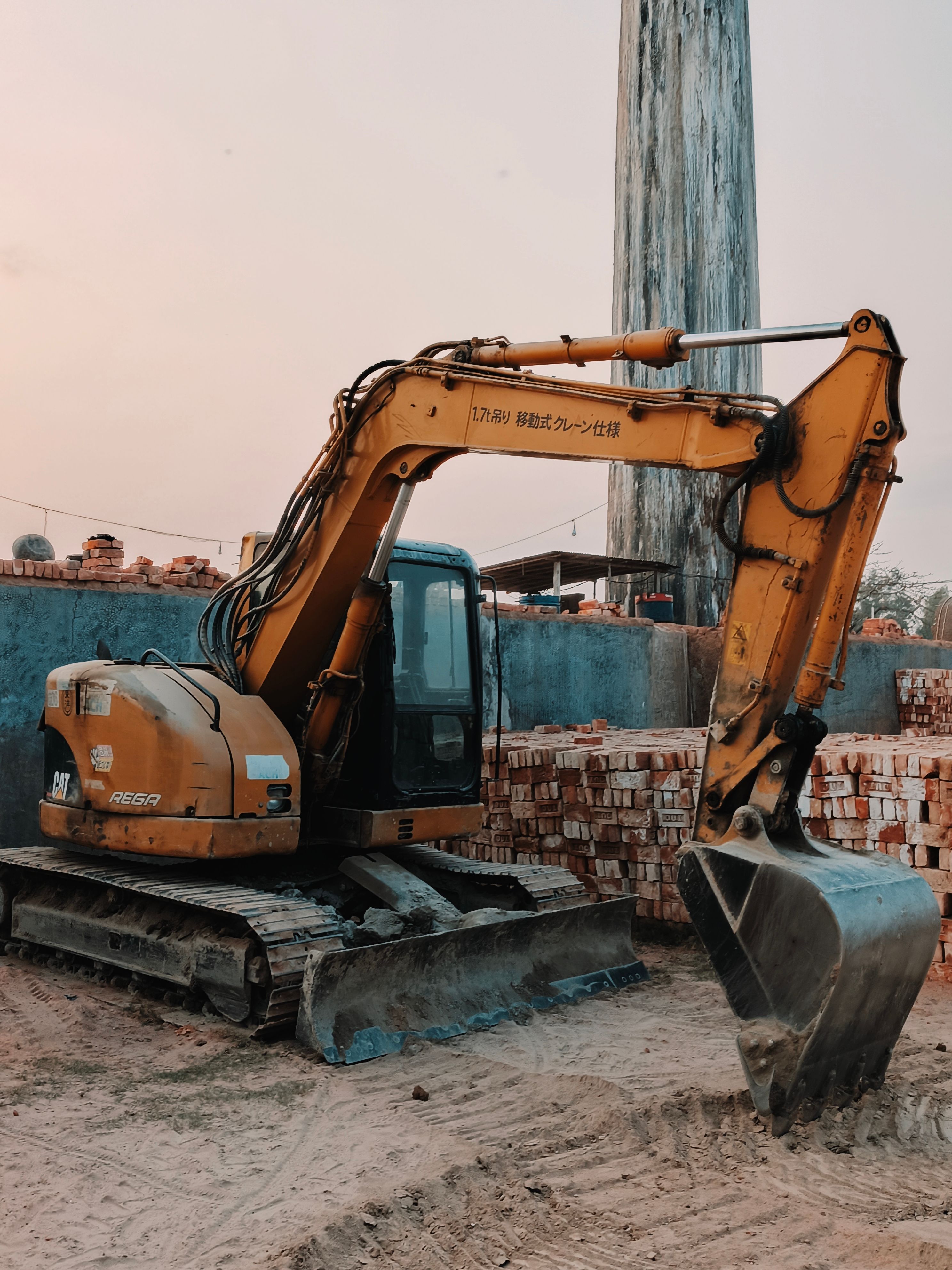 Excavator operating at an active construction site